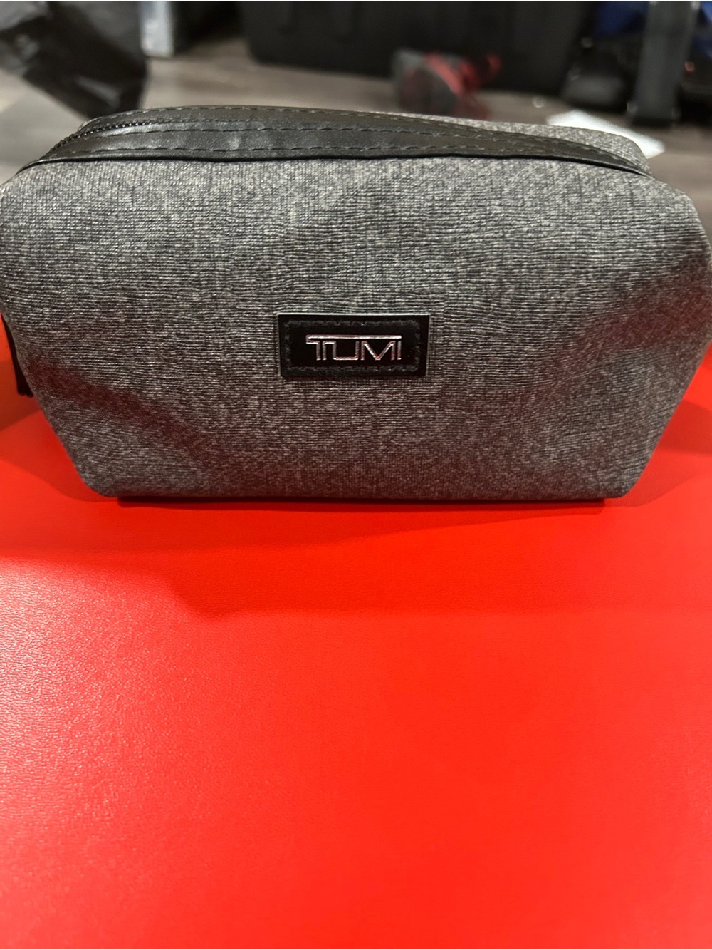 Tumi Gray Textured travel Toiletry Dopp Kit contents sealed